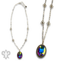 Large oval crystal pendant and flower chain necklace